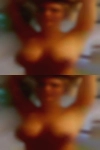 Naked girls lifting each other